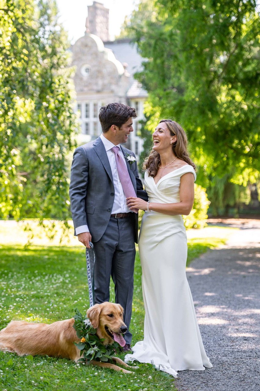 Bride and groom with dog Blithewold Mansion wedding