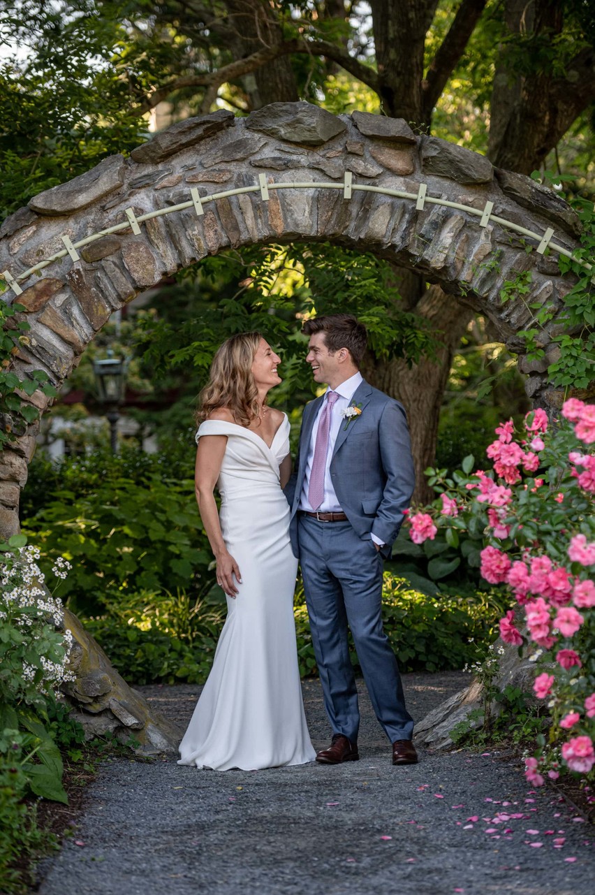 Romantic stone arch Blithewold Mansion wedding portrait