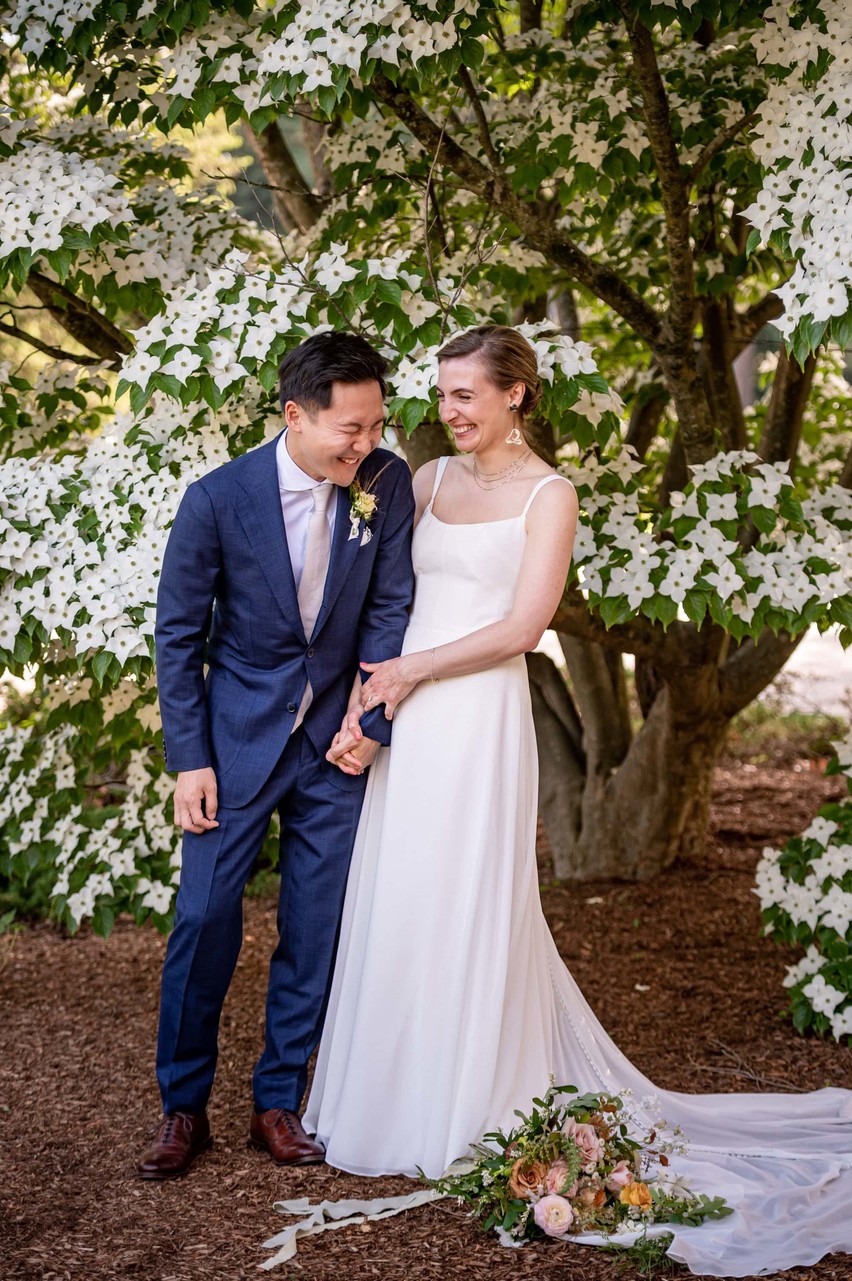 Bride and Groom by a dogwood tree at deCordova Museum Weddings