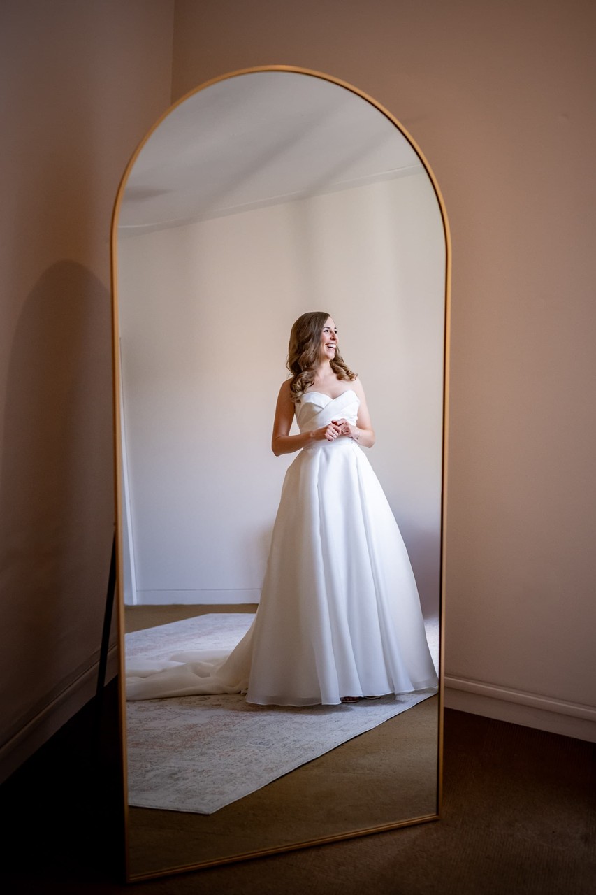 Bride reflected in wedding suite deCordova Museum weddings