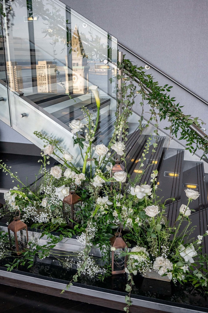 Floral staircase installation at modern Boston venue
