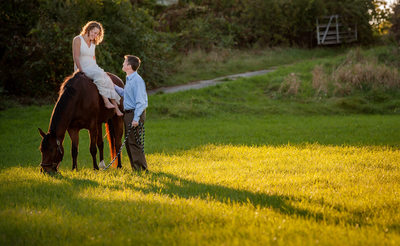 Horse barn engagement couple
