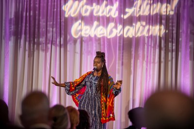 Musical artist energizing Boston gala audience