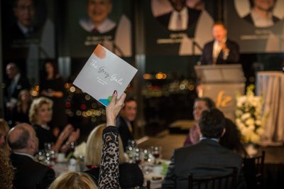 Live auction moment at Boston charity event