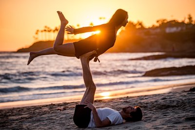 Laguna Beach engagement photos with couples yoga