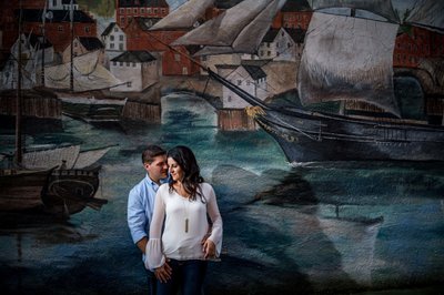 Newburyport engagement photos with historic mural