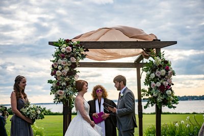 Bride and groom exchanging vows Blithewold Mansion wedding ceremony