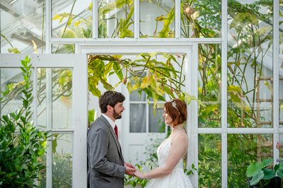 Bride and groom greenhouse portrait Blithewold Mansion wedding