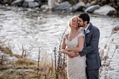 bride-groom-by-river-riverside-farm-vermont