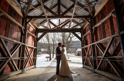 romantic-wedding-covered-bridge-vermont-riverside-farm