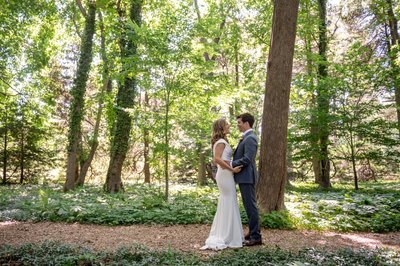 Couple in the woods Blithewold Mansion wedding portrait