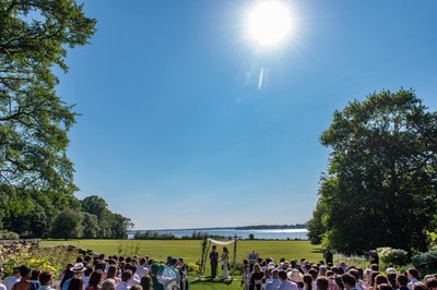 Scenic waterfront ceremony location at Blithewold Mansion wedding