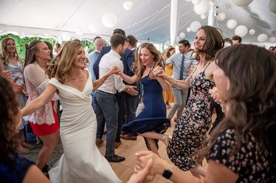 Bride dancing with guests Blithewold Mansion wedding reception