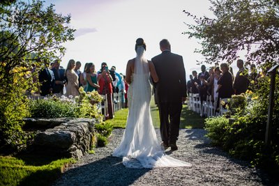 Bride walking down aisle Blithewold Mansion wedding ceremony