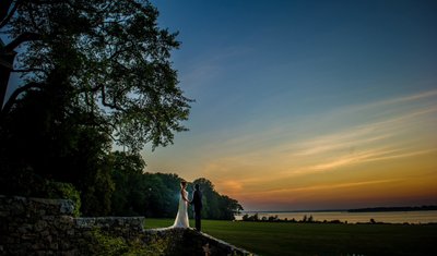 Sunset over water Blithewold Mansion wedding backdrop