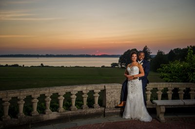 Sunset balcony portrait Blithewold Mansion wedding