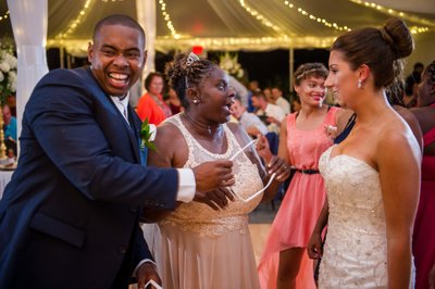 Joyful guests dancing Blithewold Mansion wedding reception