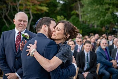 groom-hugging-mother-lakehouse-halifax