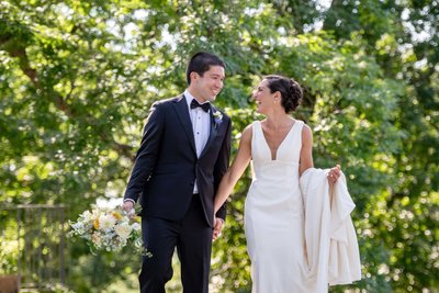 bride and groom joyful moment outdoors decordova museum weddings