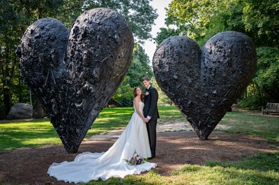 Bride and Groom by Heart Sculpture at deCordova Museum Weddings