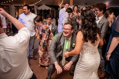 Energetic wedding party dancing at deCordova Museum weddings