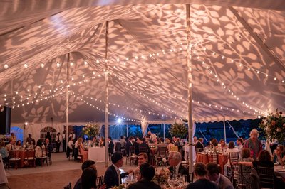 Tent reception glowing at deCordova Museum weddings