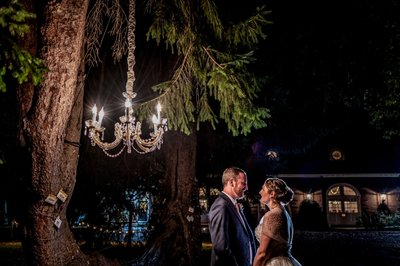 Dancing under the chandelier at an Elm Bank wedding reception