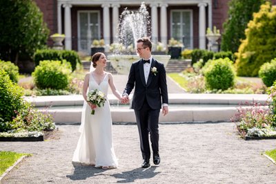 Elm Bank wedding laughing couple by the fountain