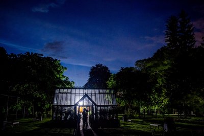 Nighttime view of the greenhouse at Elm Bank weddings venue