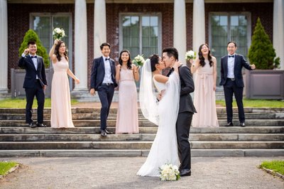 Grand view of Elm Bank mansion with wedding party in front