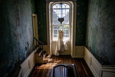 Wedding dress hanging at Long Hill wedding in Beverly MA