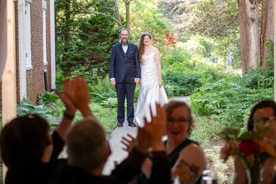 Just married couple heading to the Long Hill wedding reception