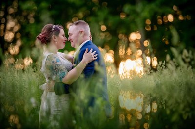 Golden hour field kiss – Fern Hill Barn wedding photos