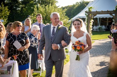 Bride walking down the aisle – Fern Hill Barn ceremony