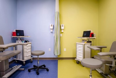 Colorful healthcare exam room interior photography