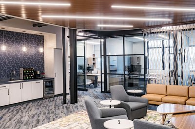 Modern lounge with coffee bar and soft seating