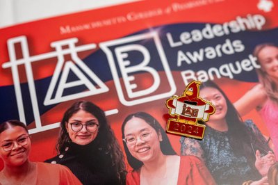 Corporate event brochure detail for a leaderhip banquet