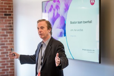 Speaker engages audience at Boston corporate event
