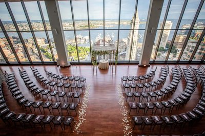 Wide-angle of State Room ceremony setup daytime city view