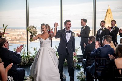 Joyful post-ceremony moment with bride and groom