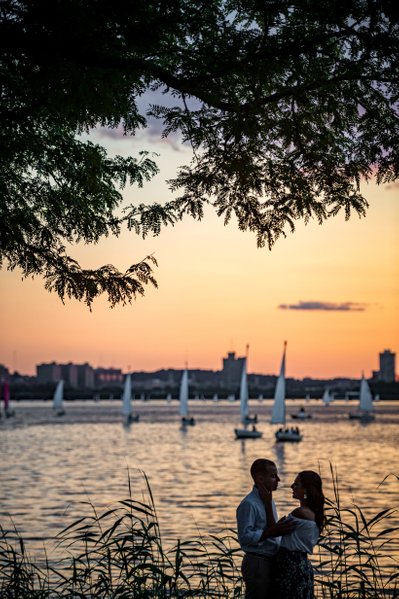 Charles River Esplanade engagement photos with sunset and sailboats