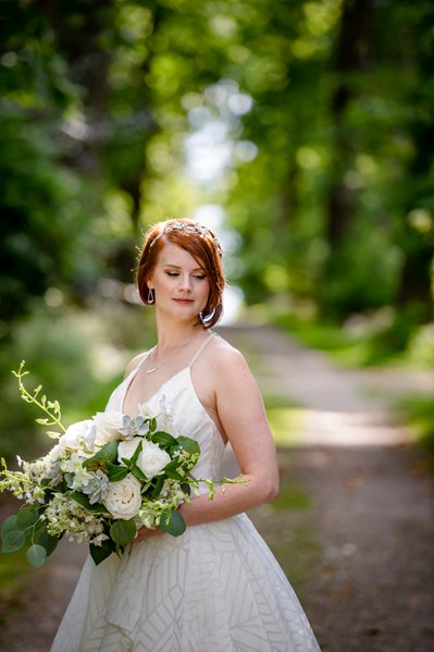 Bride holding bouquet Blithewold Mansion wedding gardens