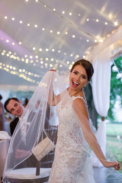 Bride twirling veil Blithewold Mansion wedding