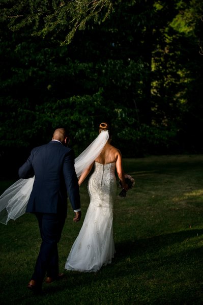 Bride and groom dramatic light Blithewold Mansion wedding