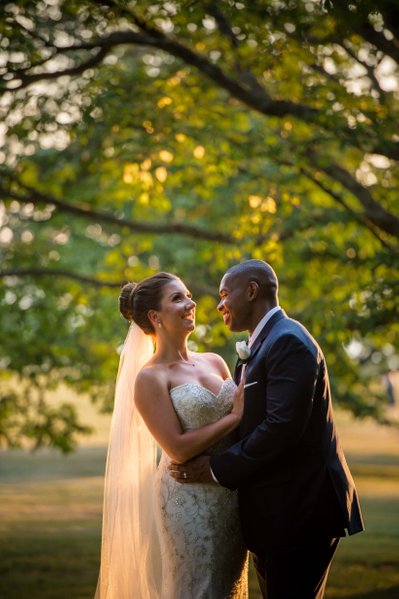 Laughing couple at Blithewold Mansion wedding