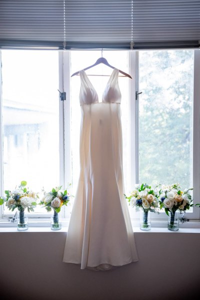 Elegant bridal gown hanging at deCordova Museum weddings