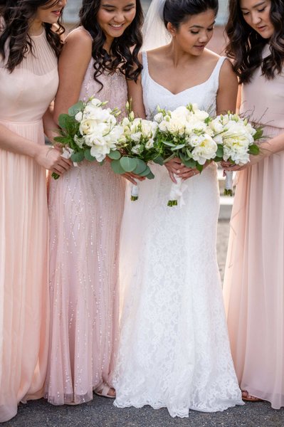 Bridal party checking out their flowers at Elm Bank weddings