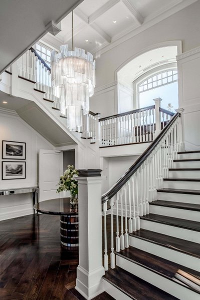 Exquisite modern staircase and chandelier
