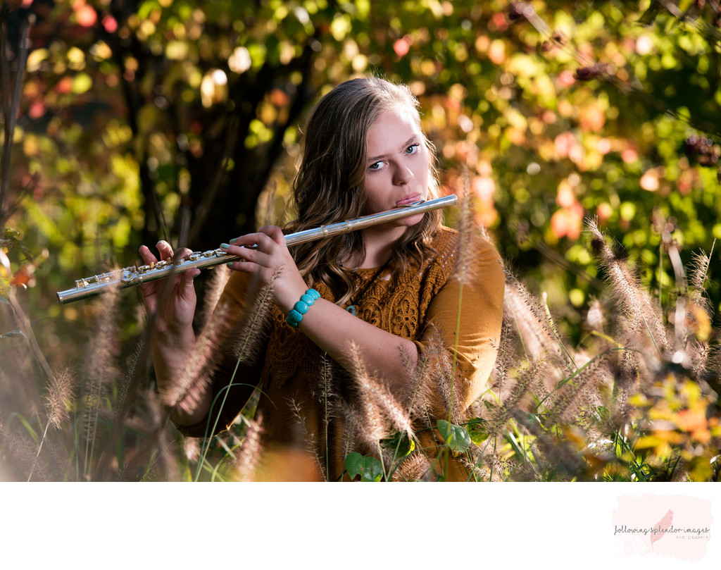 Senior Girl Portrait At Wildwood Park Playing Flute