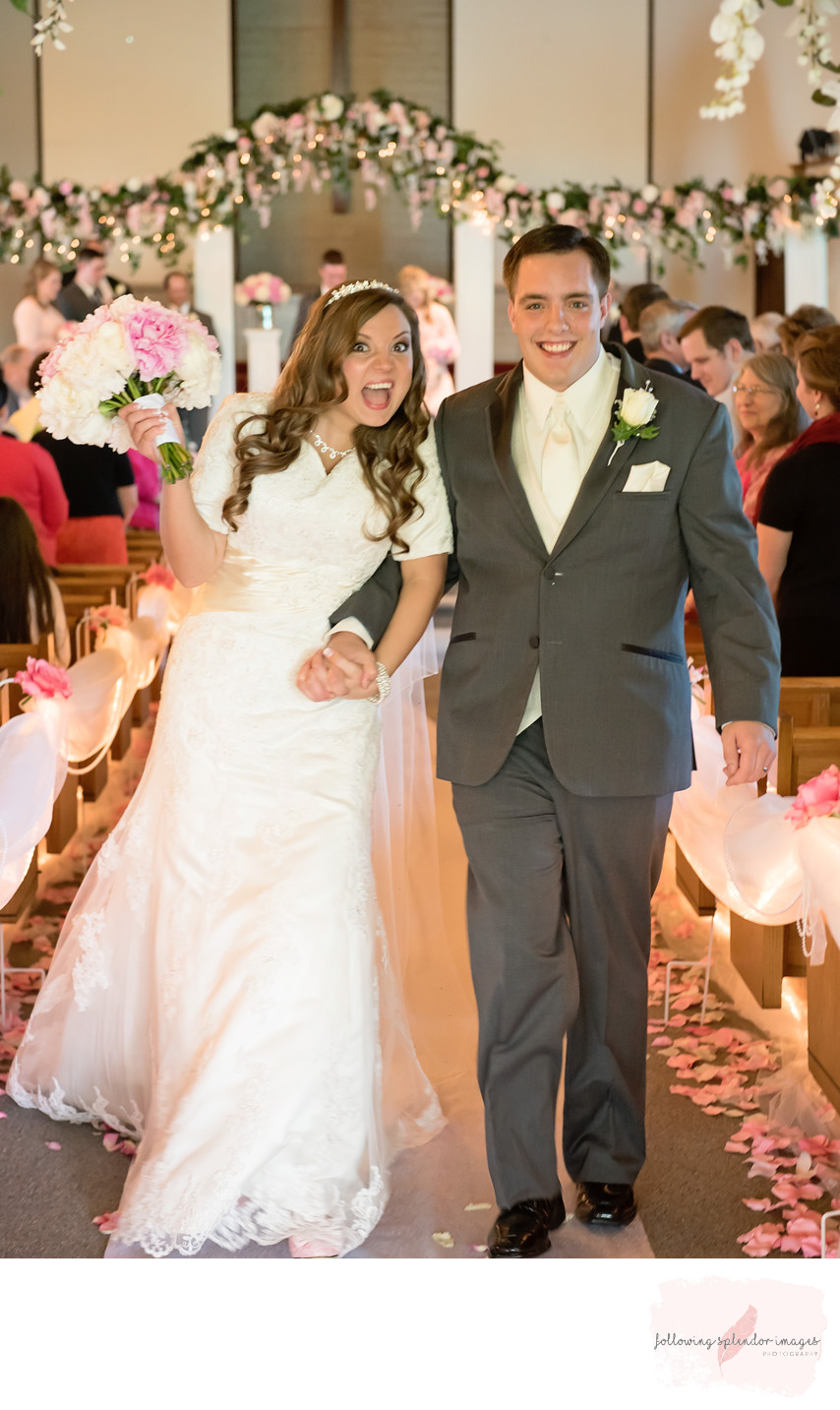 Smiling Bride and Groom after a Pink Wedding